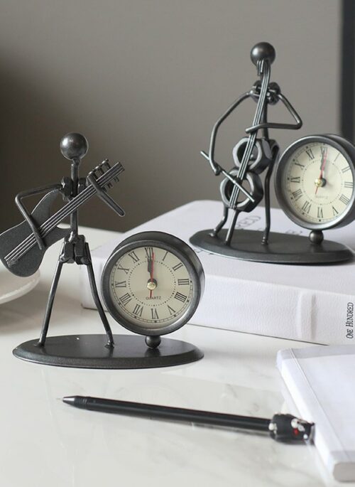 Black Iron Clock with Playing Instrument