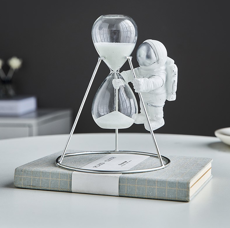 Resin Astronaut Holding an Hour Glass | Aesthetic Decor Shop